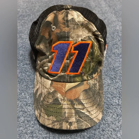 NASCAR Joe Gibbs Racing Camo hat with purple 11 embroidered with orange trim. - Picture 1 of 3